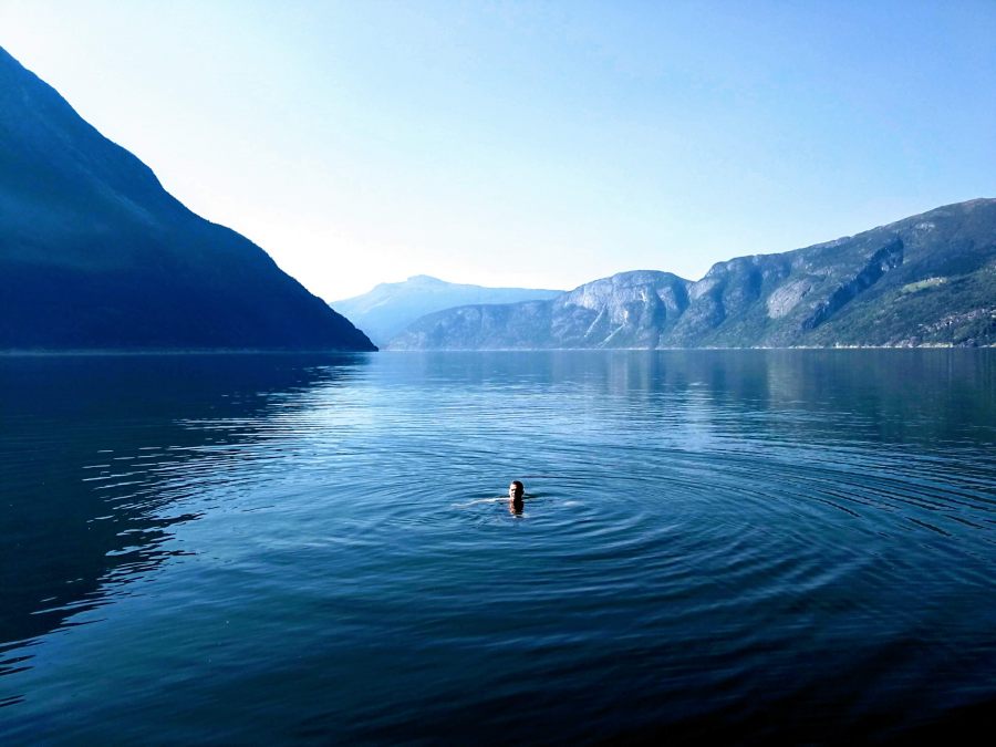 Wild swimming at Eidfjord in Norway
