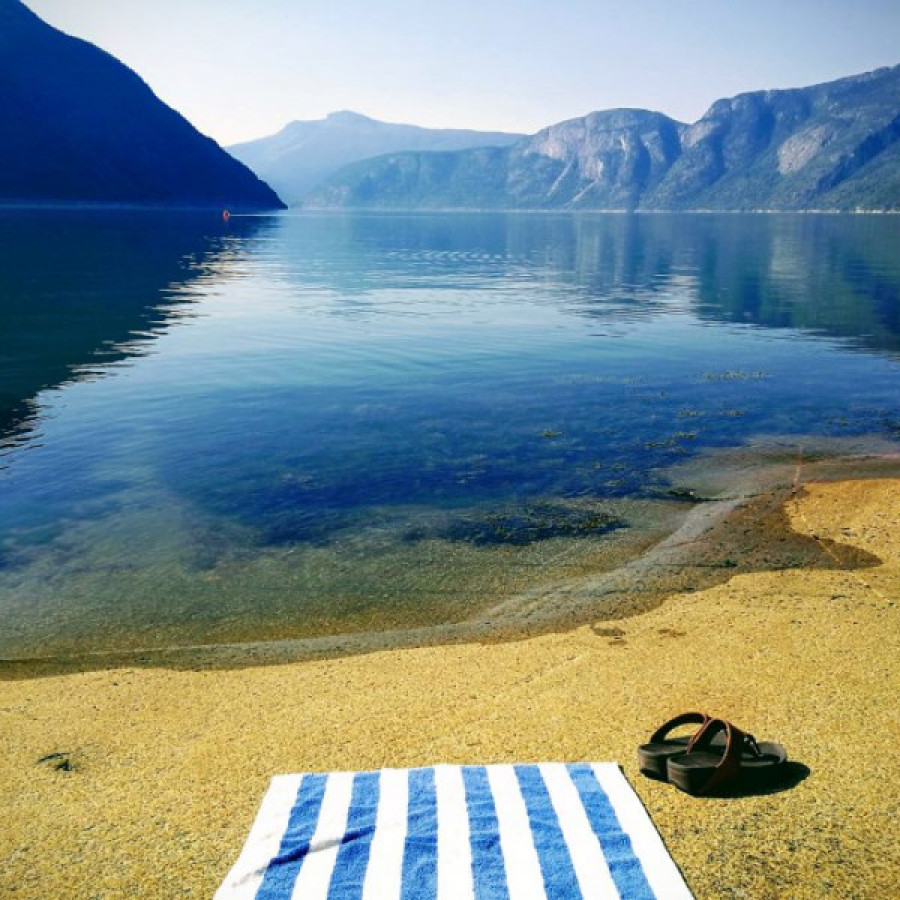 Wild swimming at Eidfjord in Norway